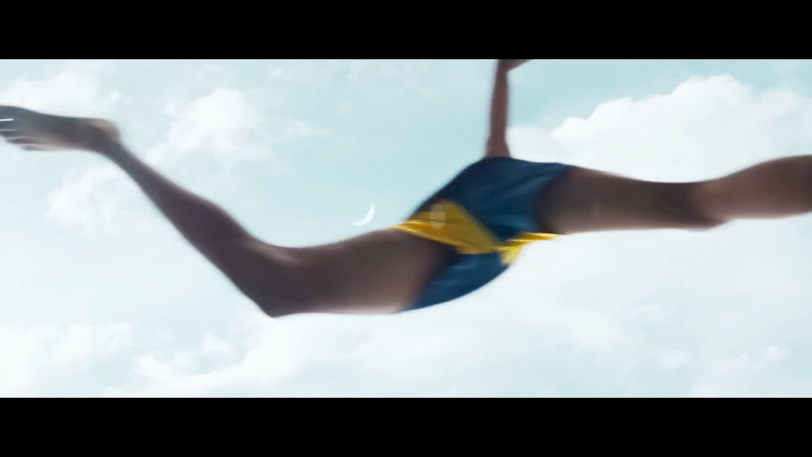 a woman in a bikini flying through the air