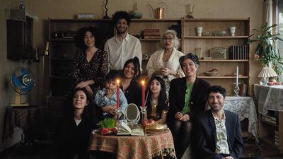 a group of people sitting around a table