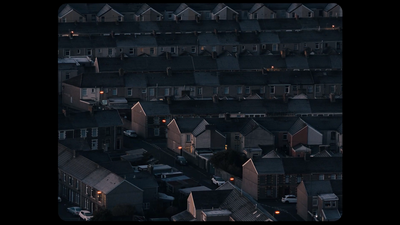 an aerial view of a city at night