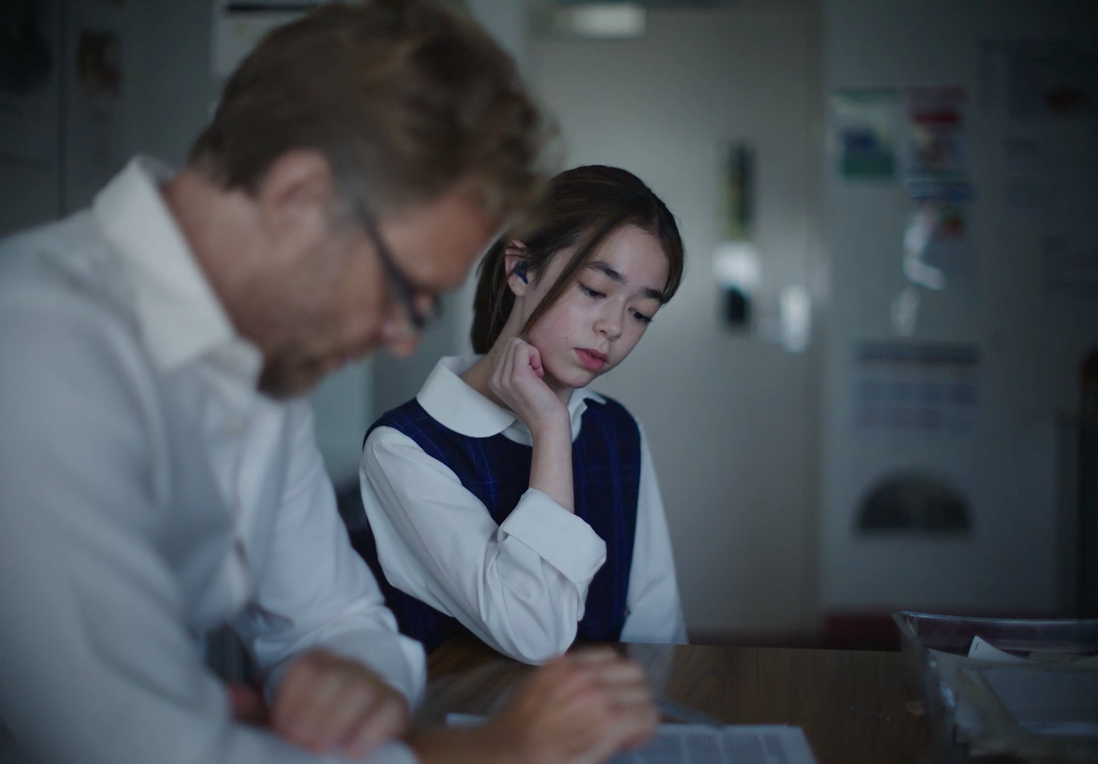 a man and a woman sitting at a table