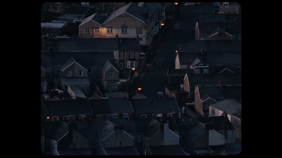 an aerial view of a city at night