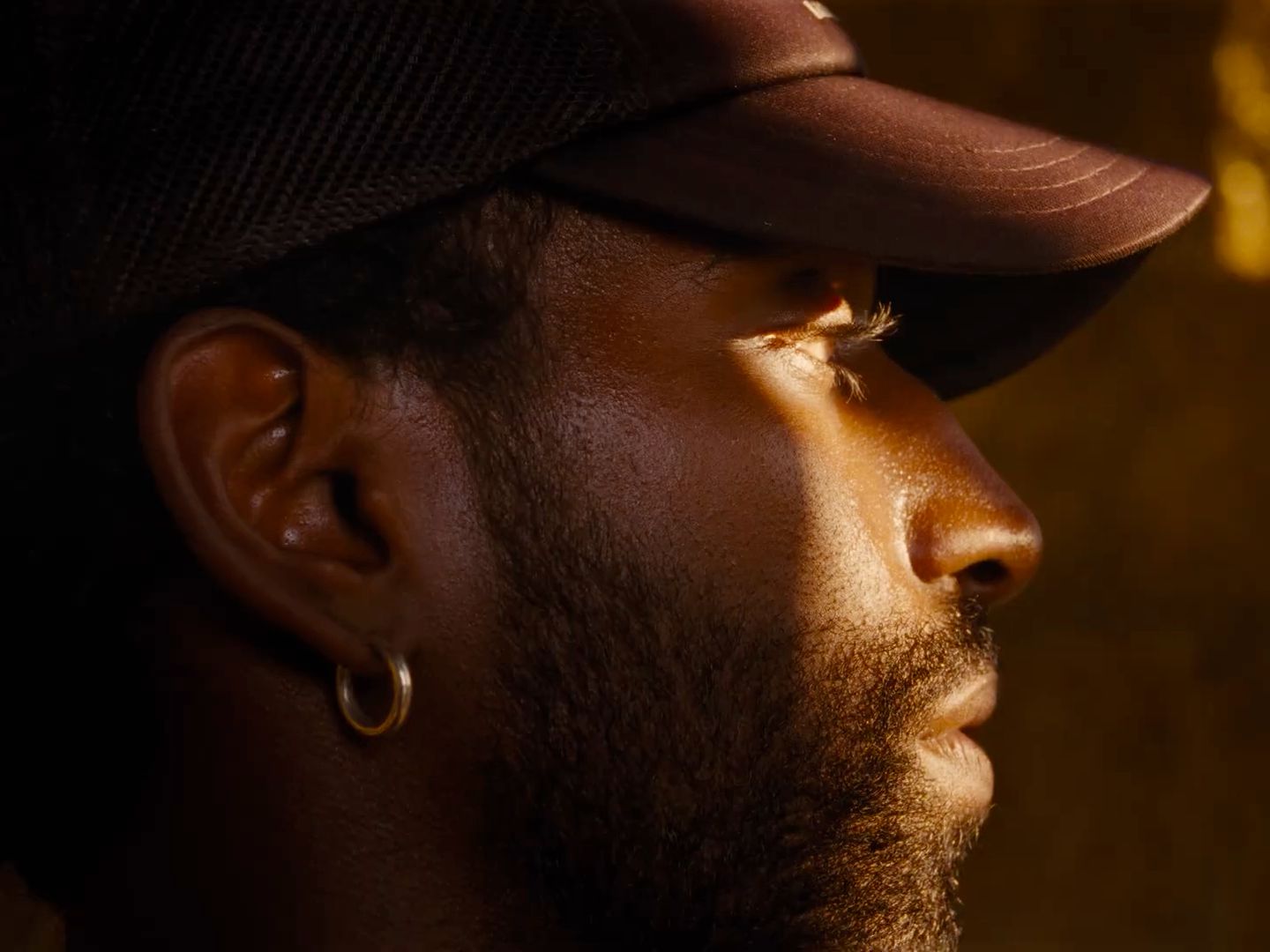 a close up of a person wearing a hat