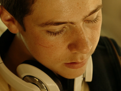 a close up of a person wearing headphones