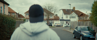 a person standing in the middle of a street