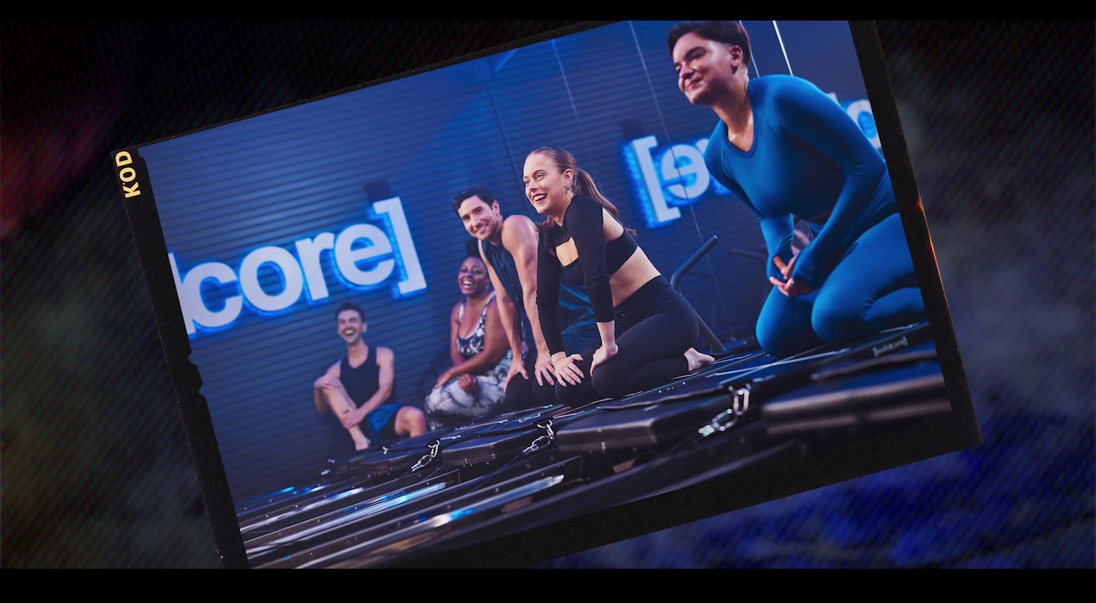 a television screen showing a group of people doing exercises