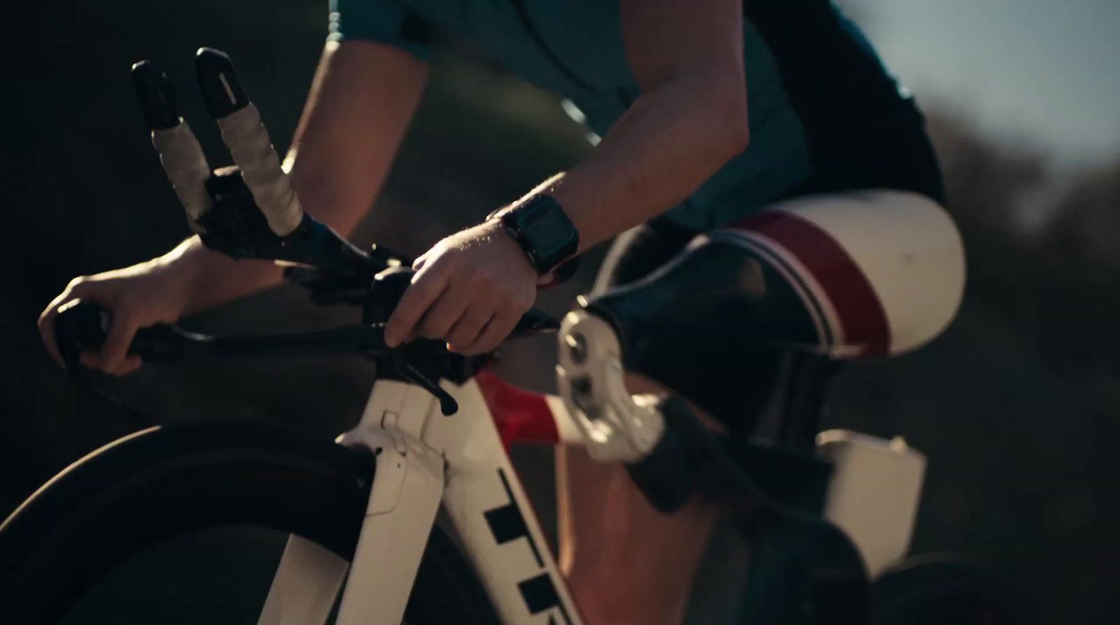 a close up of a person riding a bike