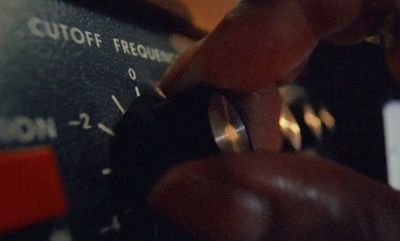 a close up of a person holding a ring