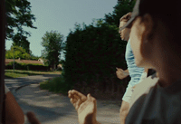 a group of people riding on the back of a bus