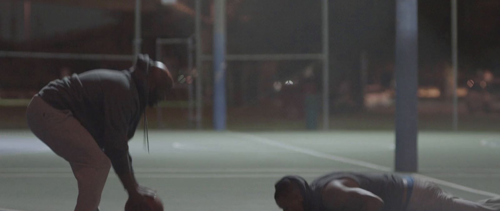 a man and a woman on a tennis court