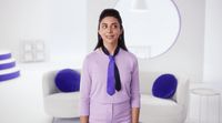 a woman wearing a purple shirt and a blue tie