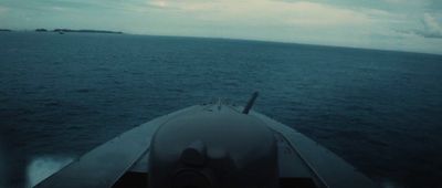 a view of the back of a boat in the ocean