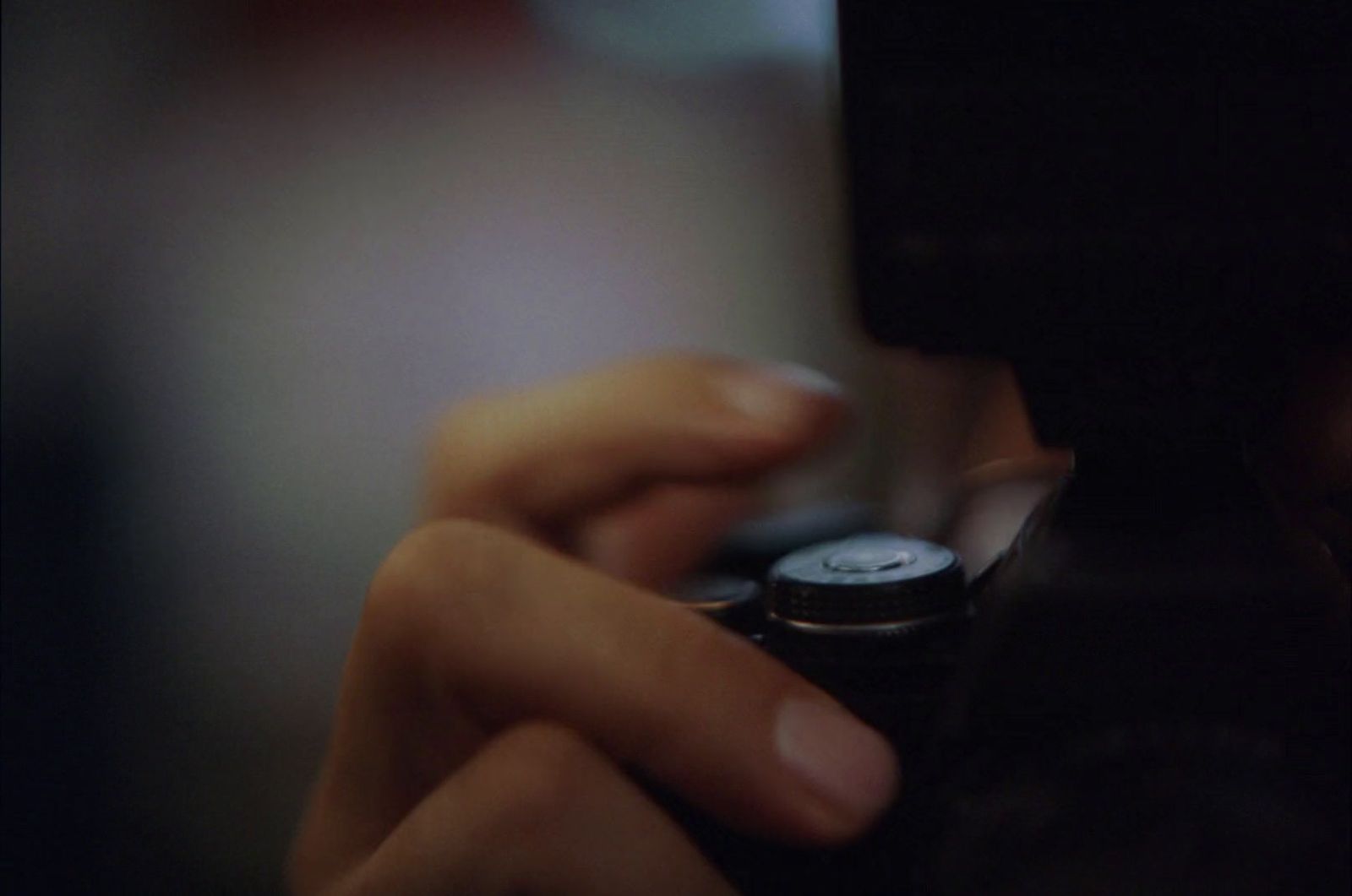 a close up of a person holding a cell phone