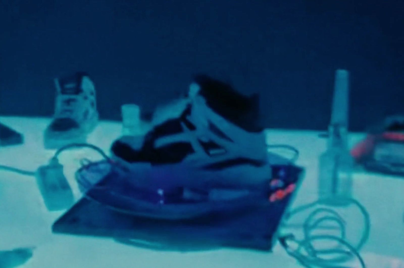 a pair of shoes sitting on top of a table