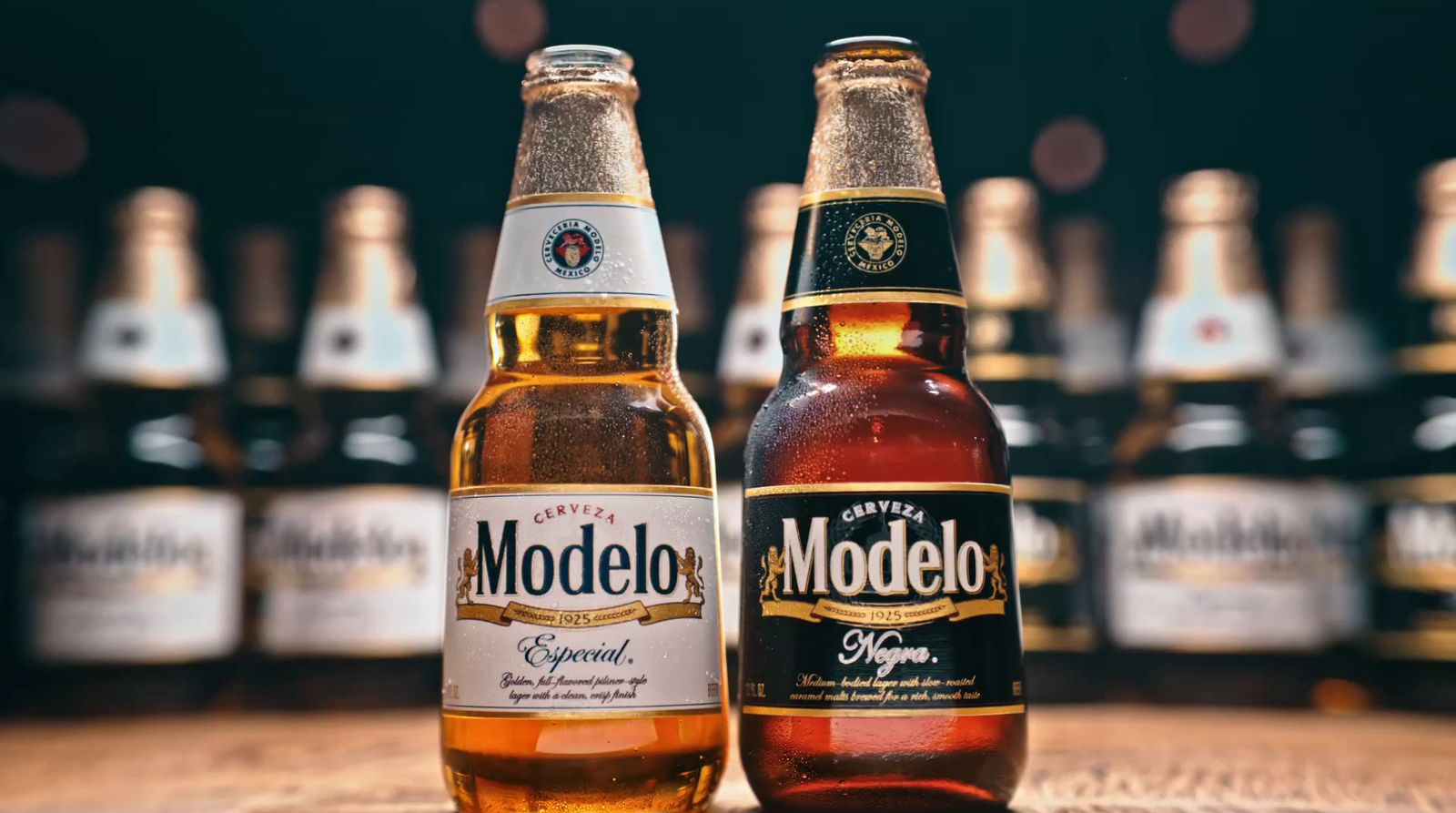 a close up of two bottles of beer on a table