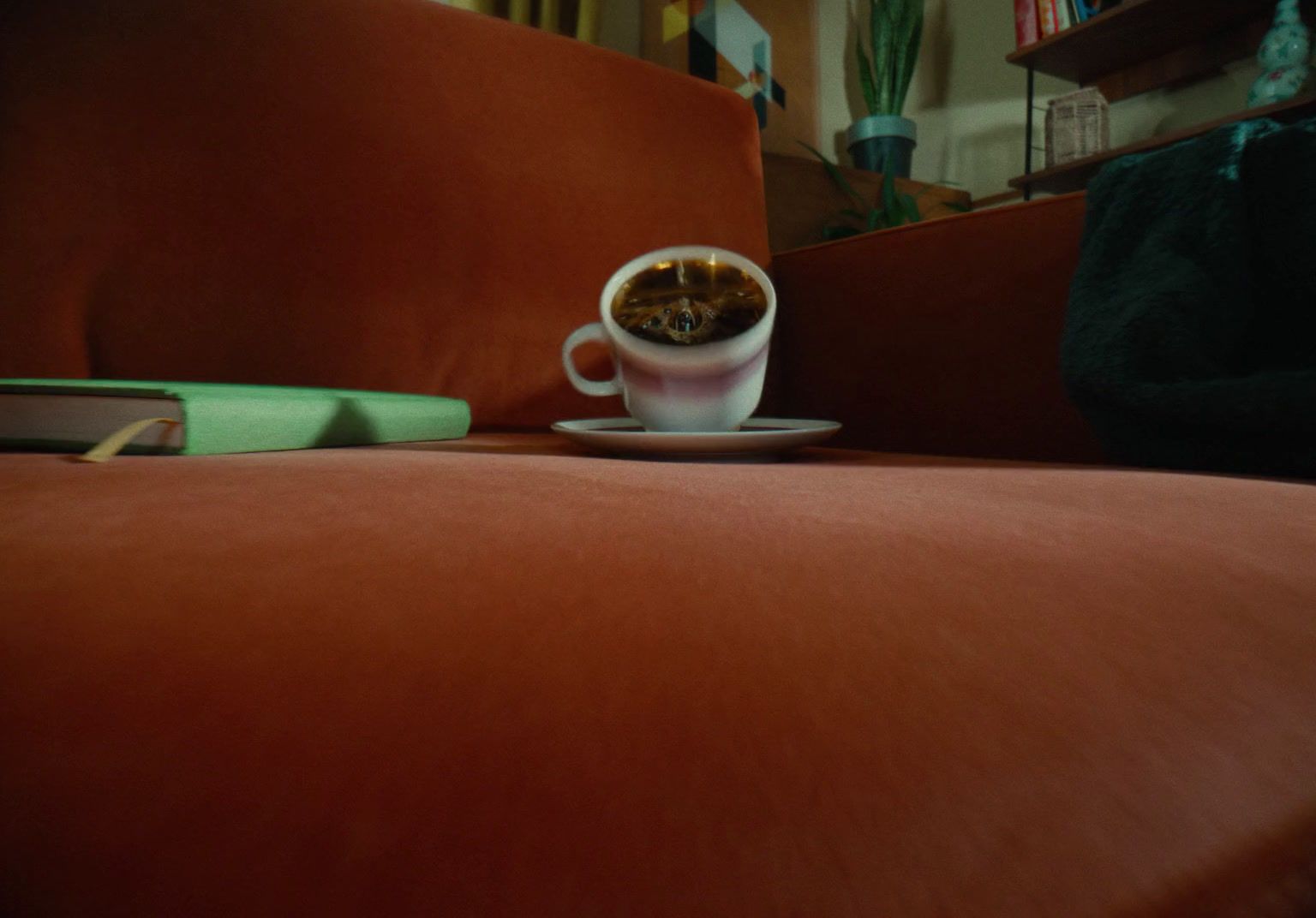 a cup of coffee sitting on top of a saucer