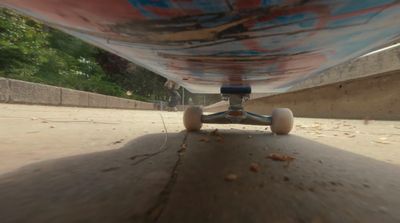 a skateboard is seen from the bottom of the board