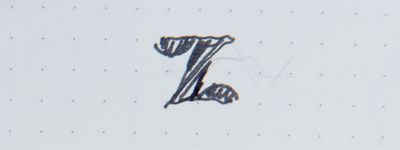 a close up of the letter z on a piece of paper