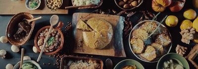 a table topped with lots of different types of food