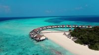 an aerial view of a resort on a tropical island