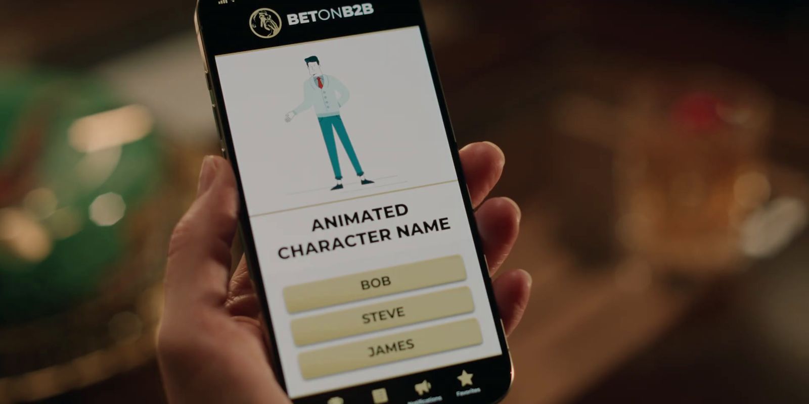 a person holding a cell phone with an animated character on the screen