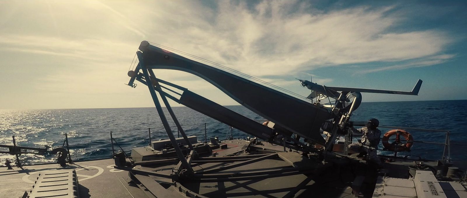 a boat with a large object on top of it