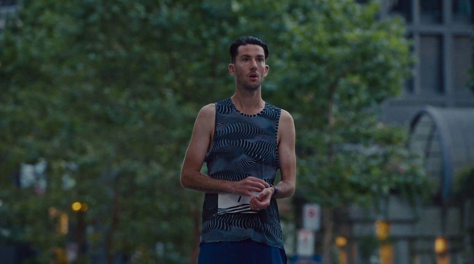 a man standing in the middle of a street