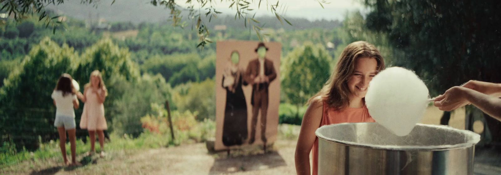 a woman holding a white frisbee in front of a group of women