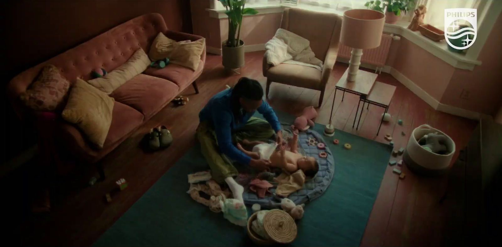 a woman sitting on a couch in a living room