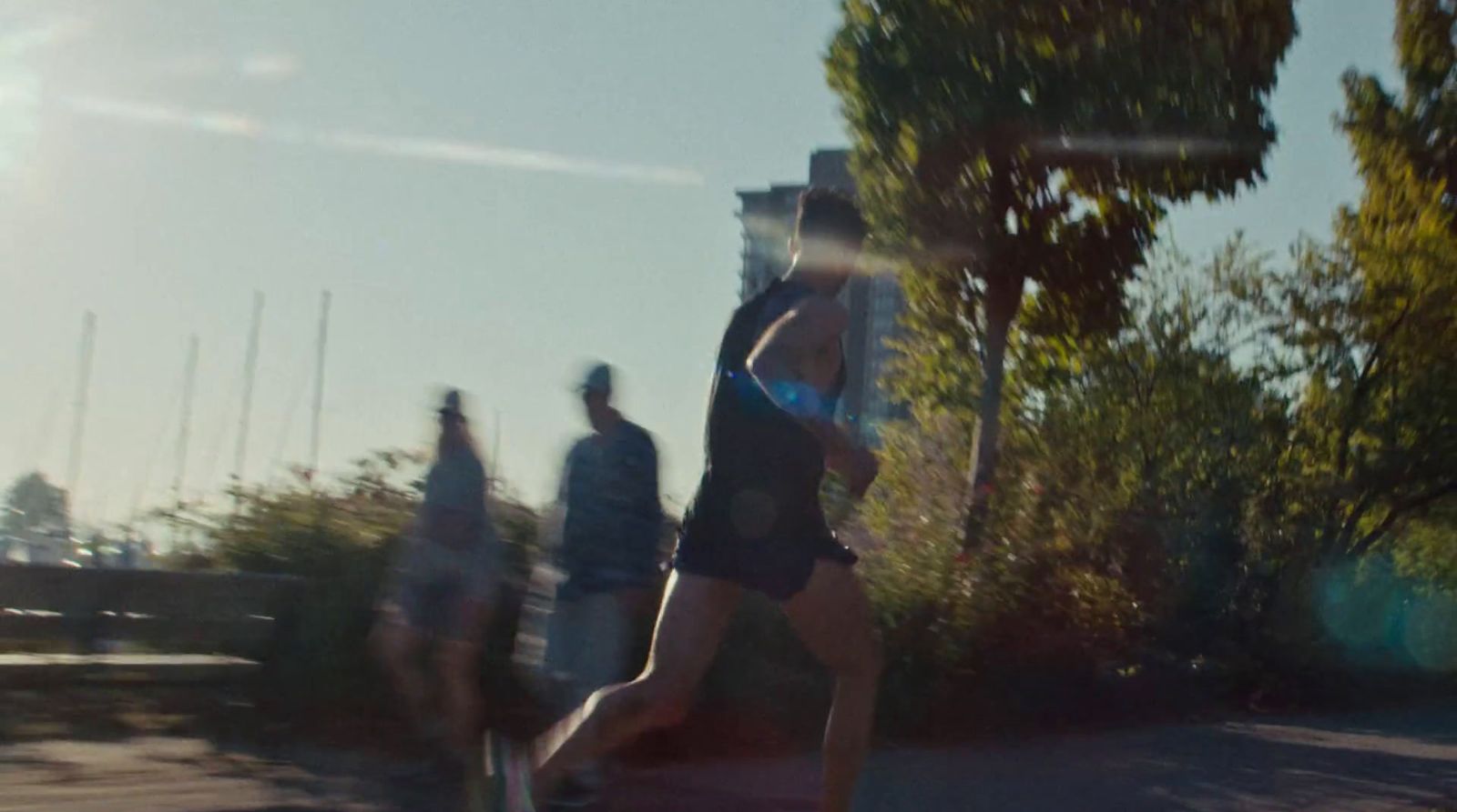 a group of people walking down a street