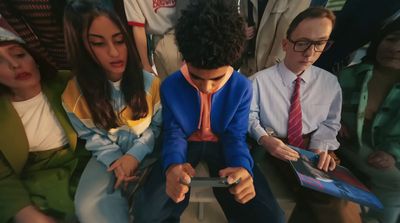 a group of people sitting next to each other