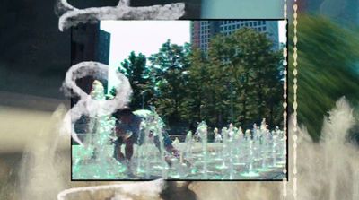 a picture of a person playing in a fountain