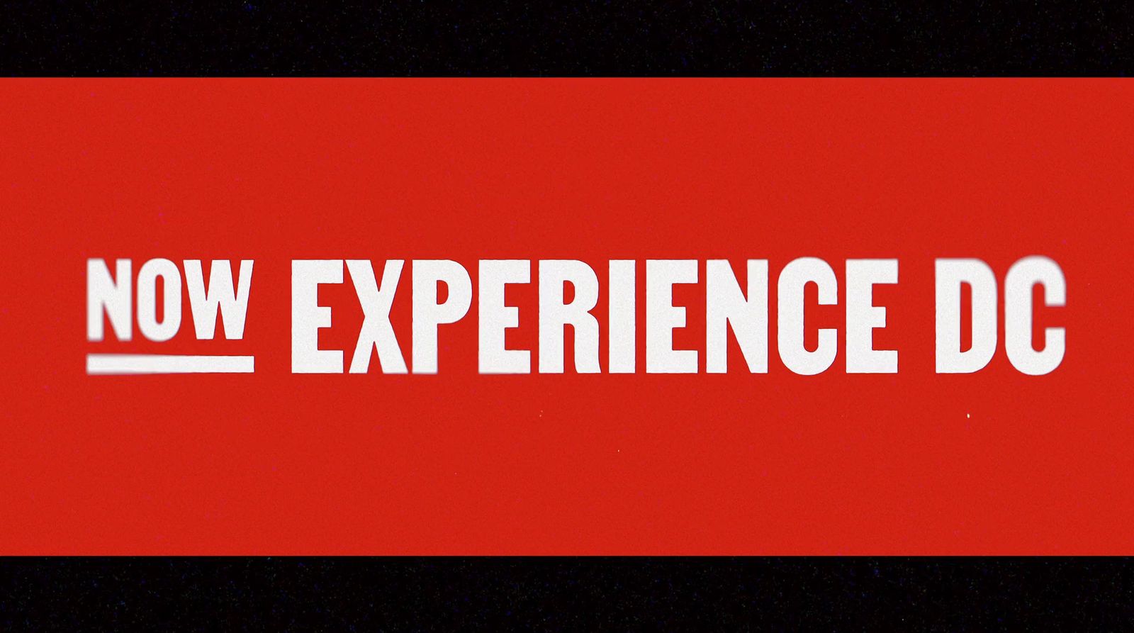 a red and black sign that says now experience dc