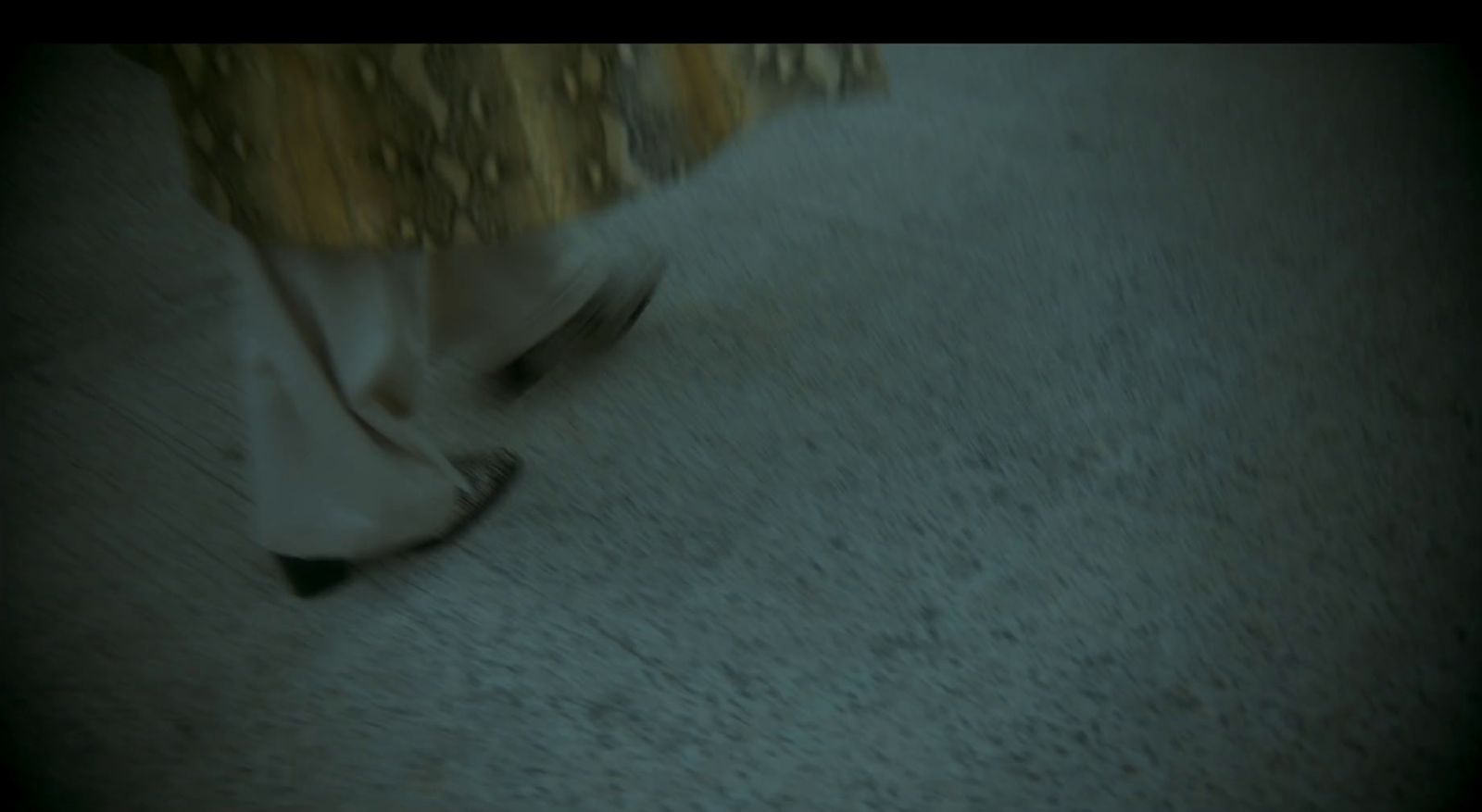 a close up of a person walking on a carpet