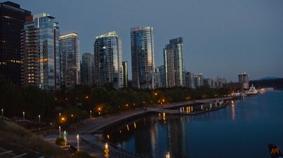 a large body of water surrounded by tall buildings