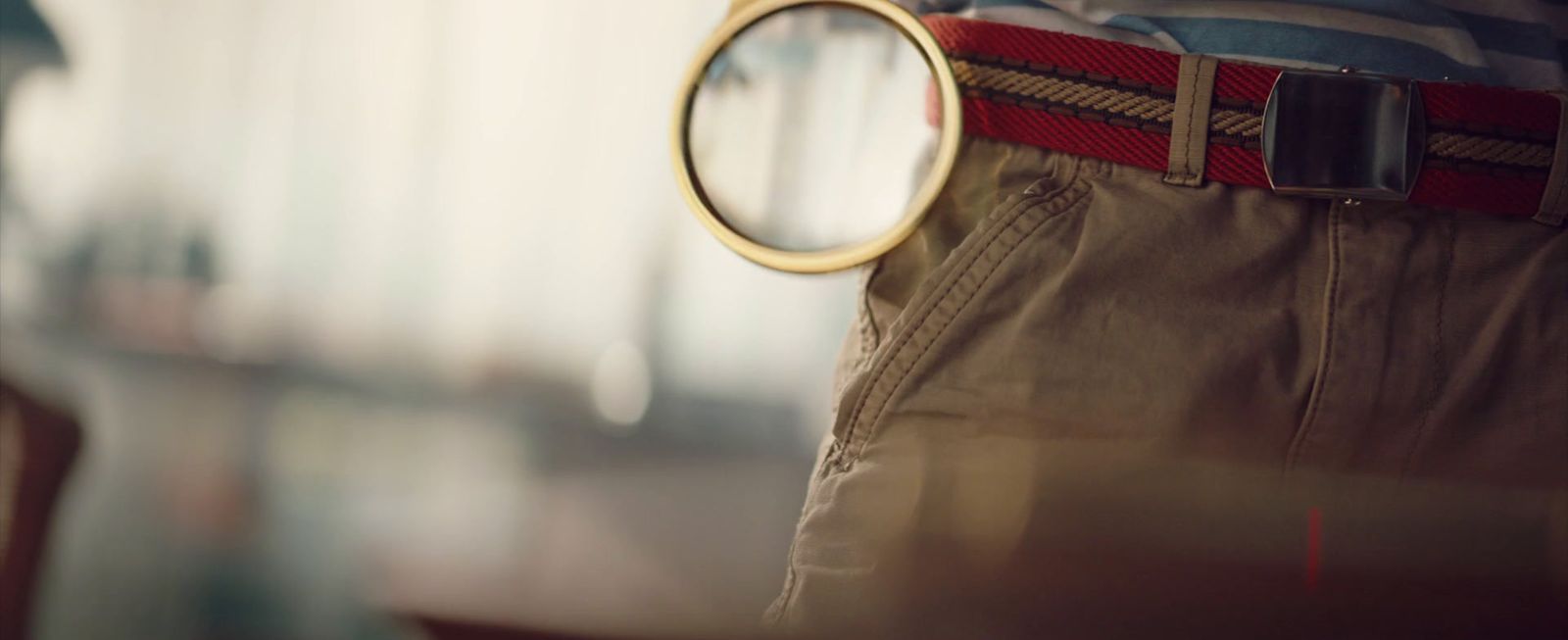 a close up of a person's pants with a magnifying glass