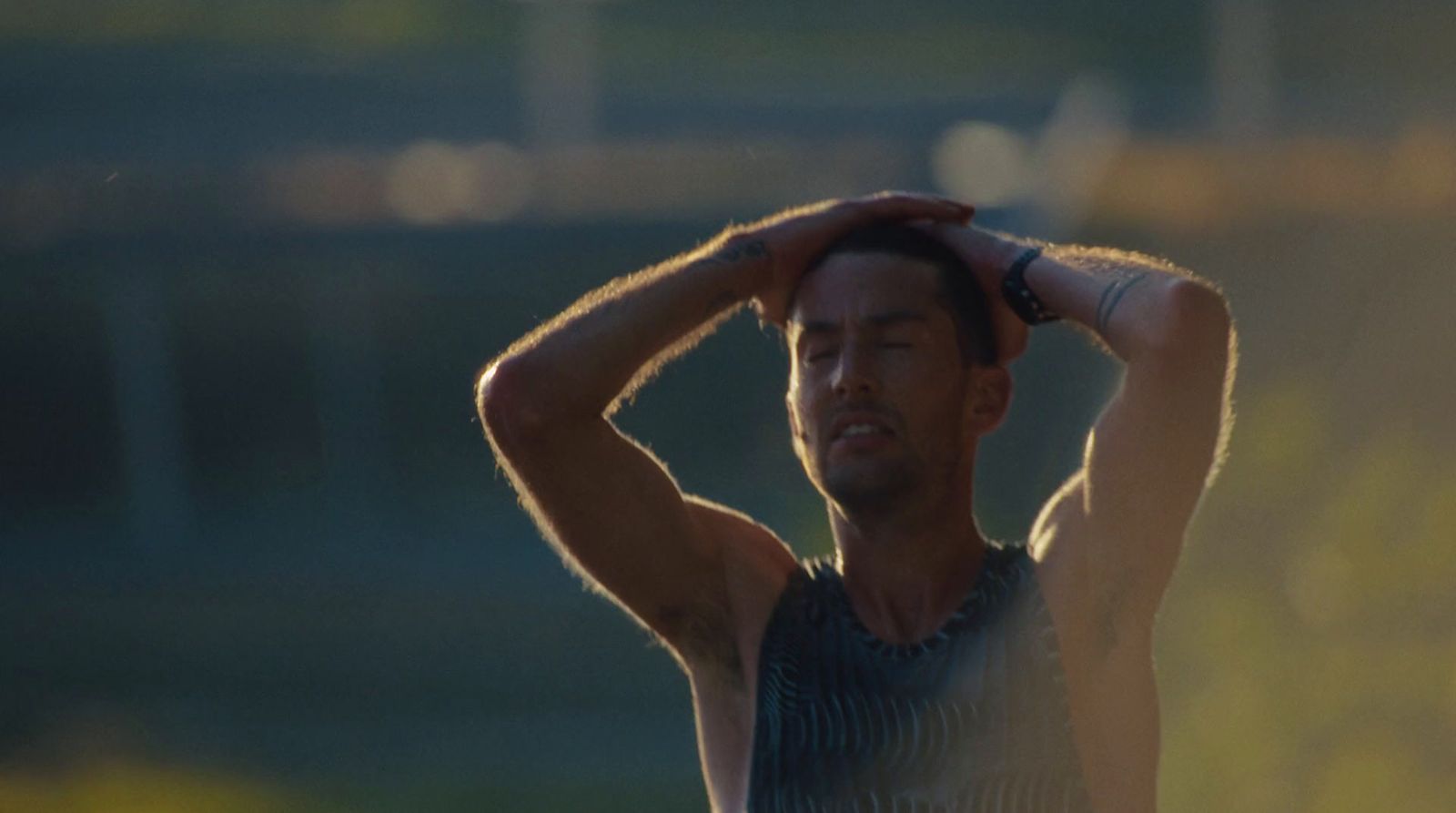 a man holding his head in his hands