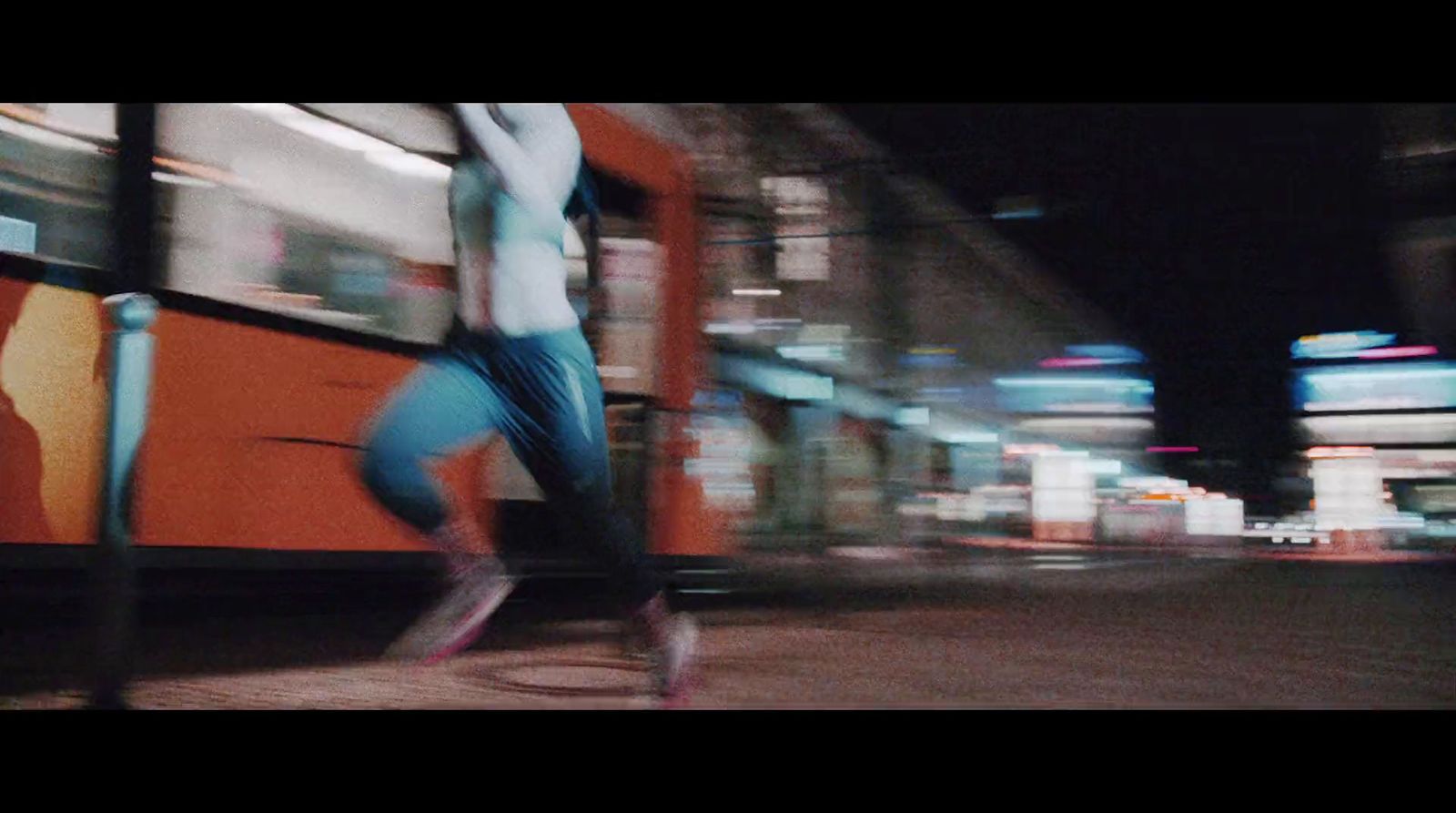 a blurry photo of a person riding a skateboard