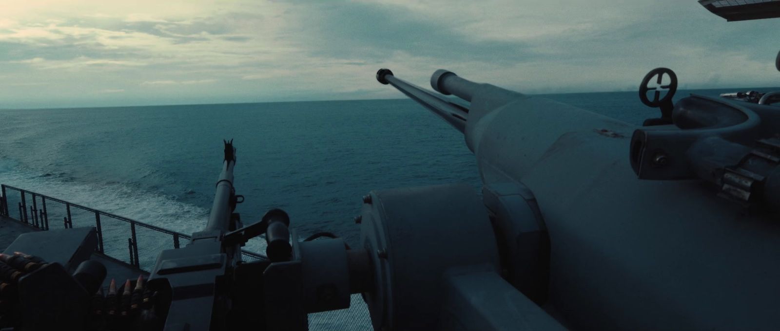 a view of the ocean from the deck of a ship