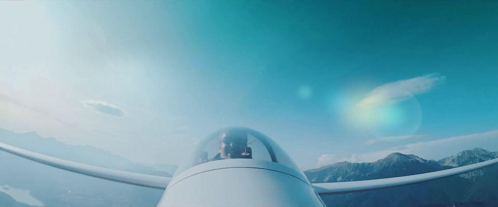 a view from inside of a plane looking at mountains