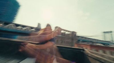 a blurry photo of a person riding a skateboard