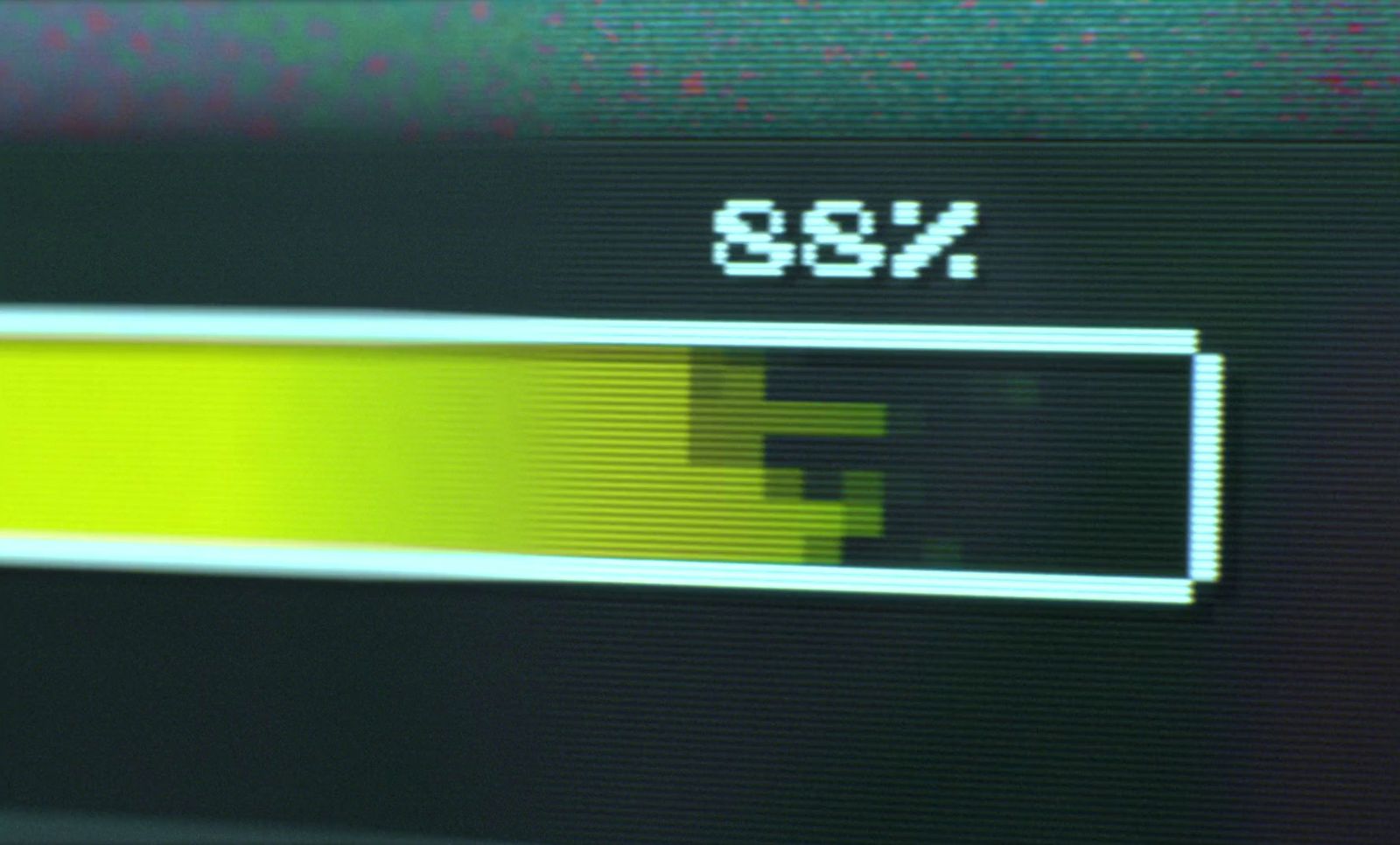 a close up of a computer screen with a yellow light