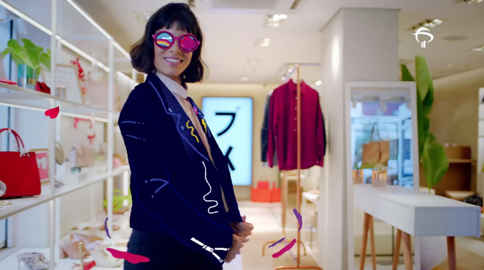 a woman wearing sunglasses standing in a store