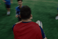 a group of young men playing a game of soccer