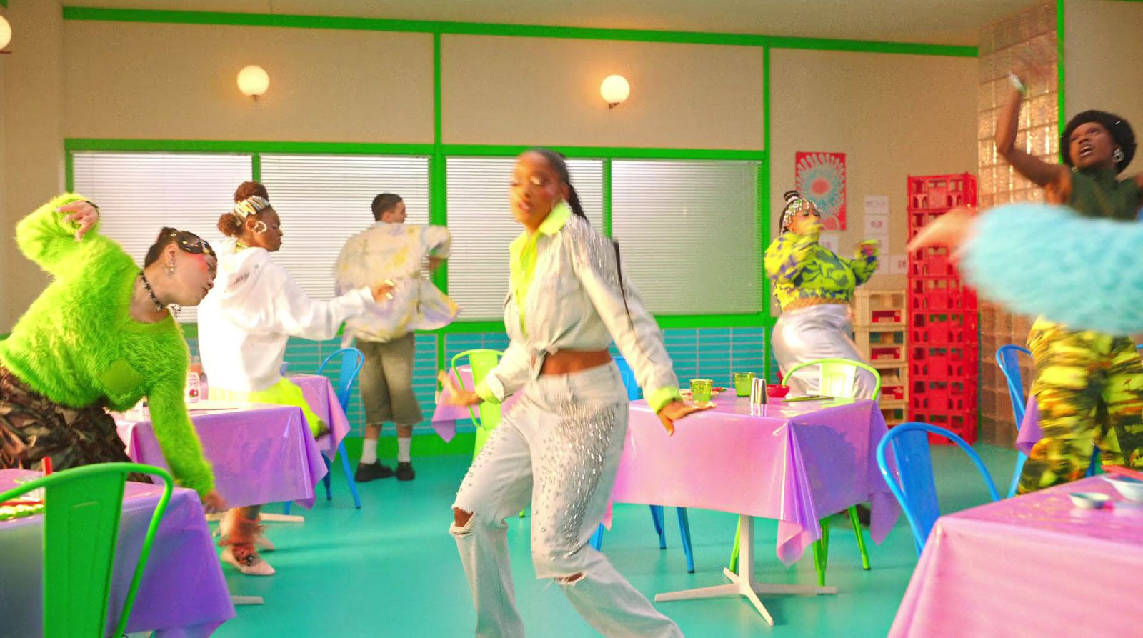 a group of people dancing in a room