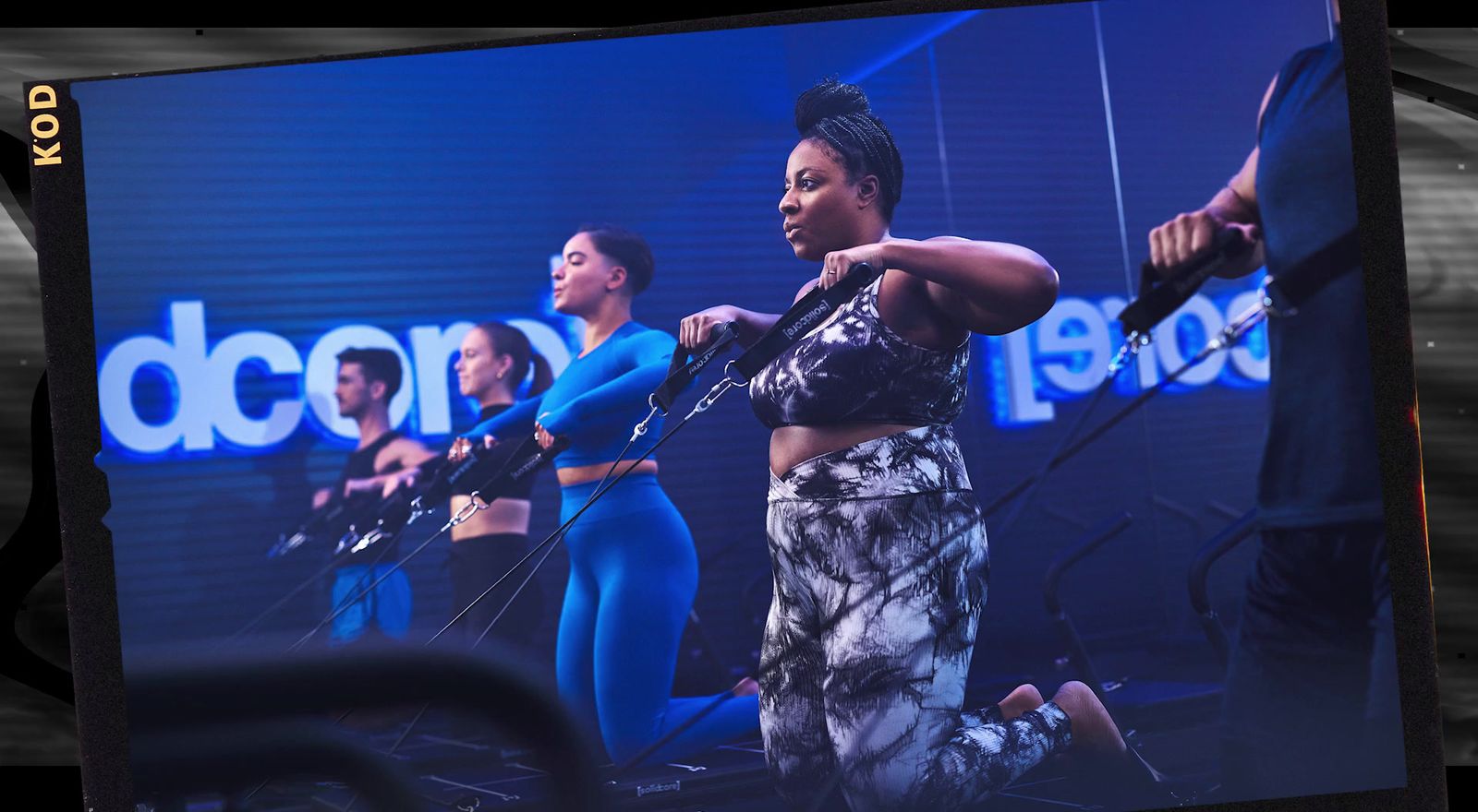 a group of women standing on a stage with microphones