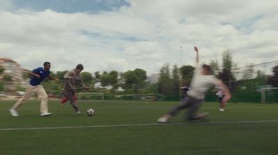 a group of men playing a game of soccer