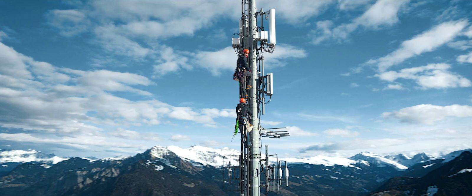 a cell phone tower with a sky background