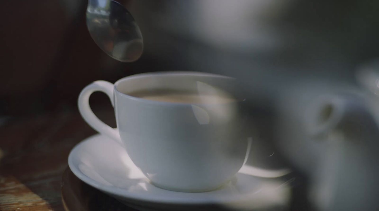 a cup of coffee sitting on top of a saucer