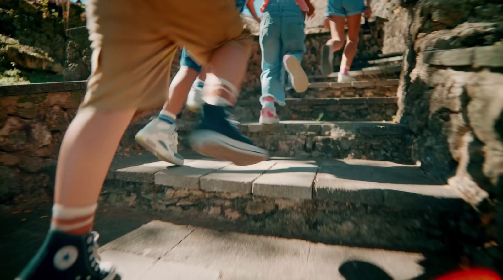 a group of people walking up some steps