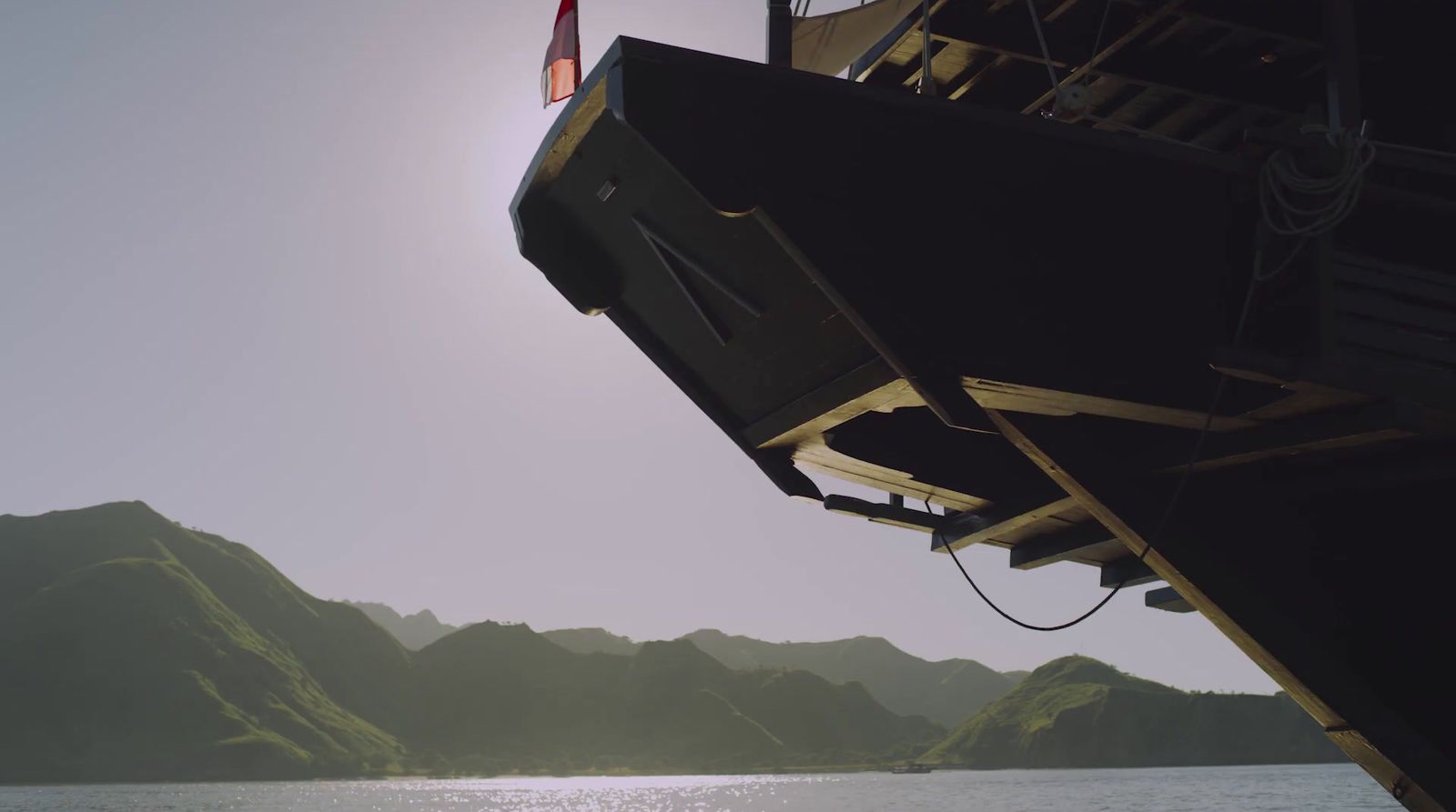 a large boat floating on top of a body of water